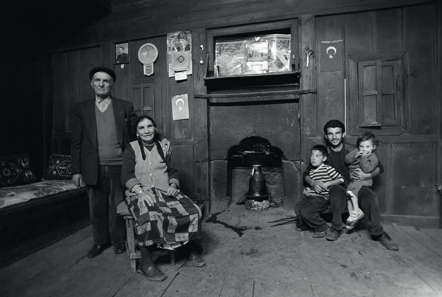 An Alevi family portrait in the wooden house